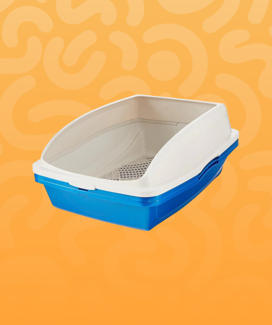 extra extra large litter box in open-plan Brisbane home next to Scandinavian furniture